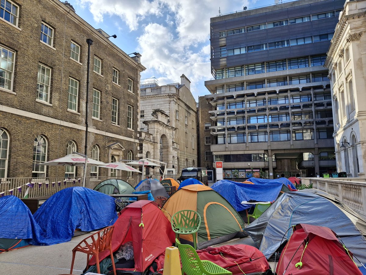 Student encampment at <a href="/KingsCollegeLon/">King's College London</a> still going strong. Students demand the College to take a stance against human rights violations by Israel in #Gaza and to boycott and disinvest from institutions benefitting from or supporting the #genocide in Gaza. #BDS