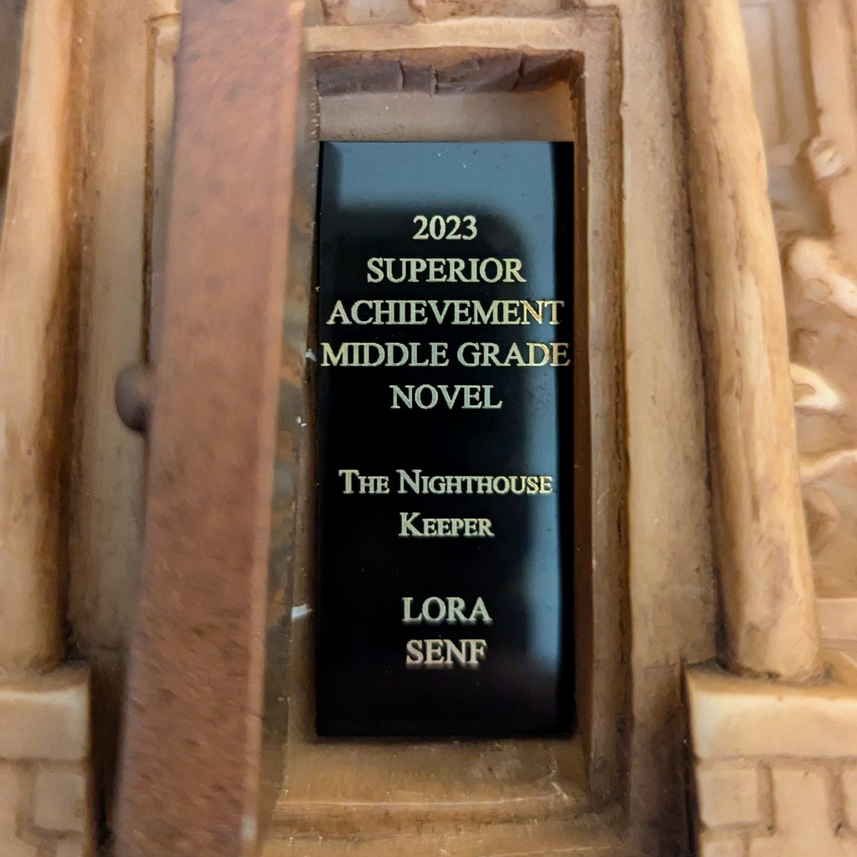Lora013's tweet photo. Poor thing got lost and took the long way getting here but my little haunted house finally made it. Still over the moon that Nighthouse Keeper won a Bram Stoker Award. Thank you @HorrorWriters members - truly, truly an honor. 🖤 https://t.co/TGY3n8GNtu