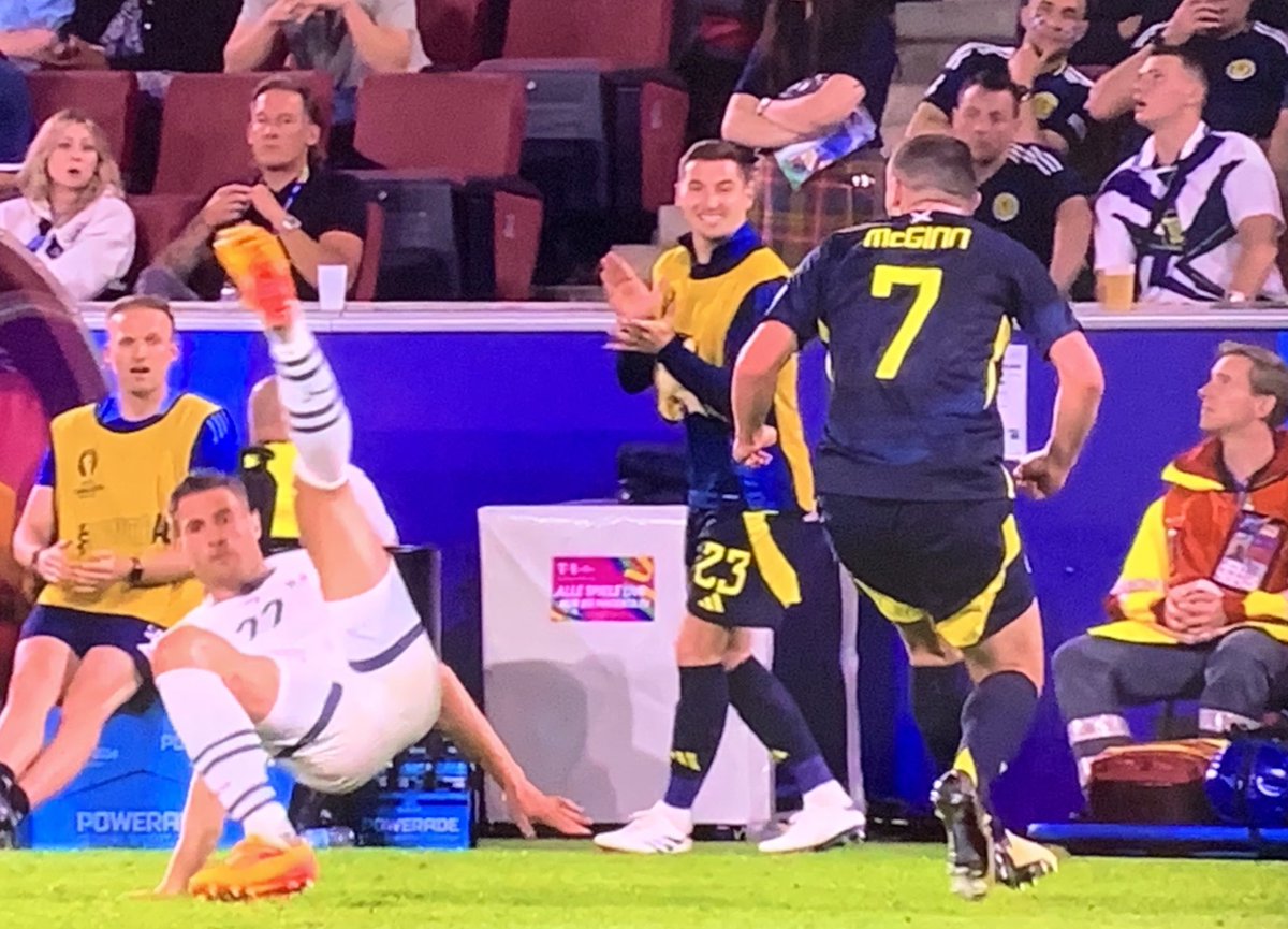 paddypower's tweet photo. The sheer joy on Kenny McLean’s face as he watches John McGinn clattering Schar. Beautiful to see.

#Euro2024 https://t.co/cn3KUeQARh