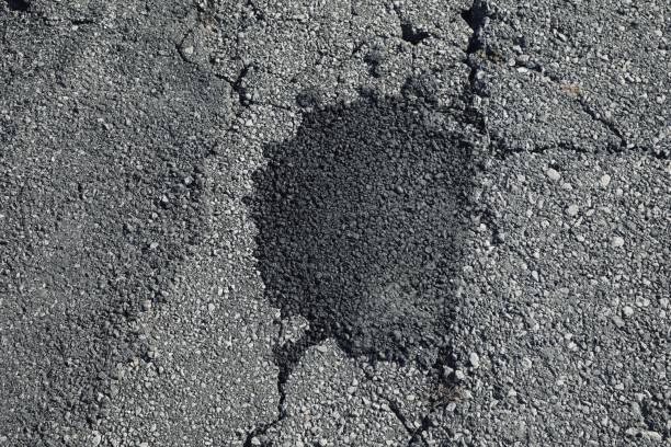 KcAsphalt's tweet photo. Regularly filling in cracks and potholes in your asphalt surface can help prevent them from expanding and causing more extensive damage. It's important to use the right materials and techniques when filling in these areas to ensure a long-lasting repair. https://t.co/wsppleob2m