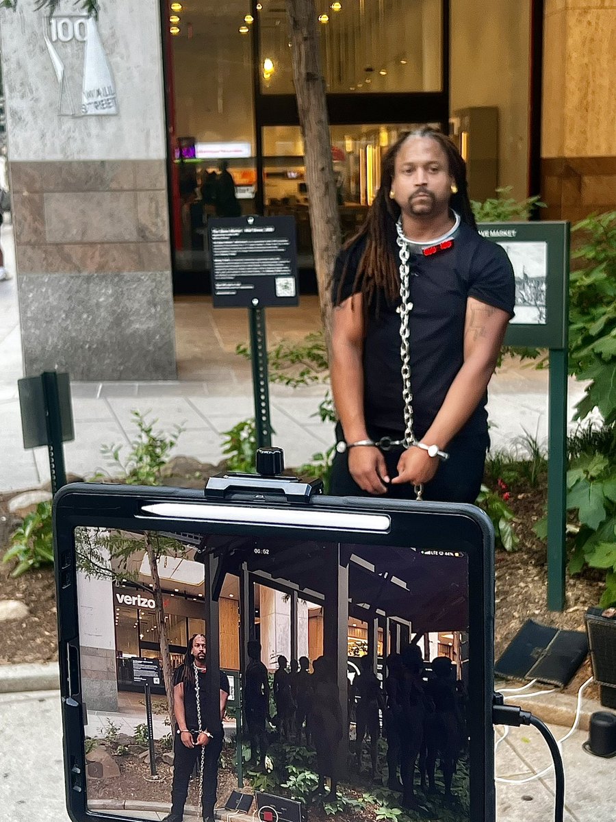 Paintwithmusic's tweet photo. Thank you to everyone who came to my performance “Market Value” on Wall Street today. Power to the ancestors. Please let everyone know about my other exhibits around NYC thank you !!! Photo credit @bethanybrichta thank you @zz_nola for all the help and love ! https://t.co/DqYbek5Q6j