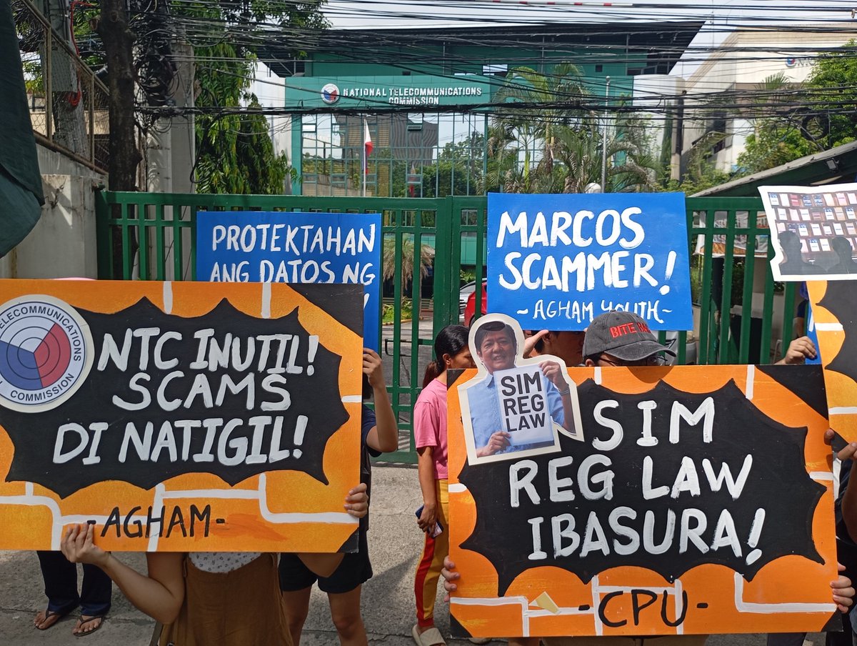 manila_today's tweet photo. LOOK: Various digital rights advocates led by Junk SIM Registration Network hold protest in front of the National Telecommunications Office to condemn the surge of scams and fraudulent SIMs in POGOs nearly a year since the SIM Registration Law was fully implemented. https://t.co/3puEKEZae7