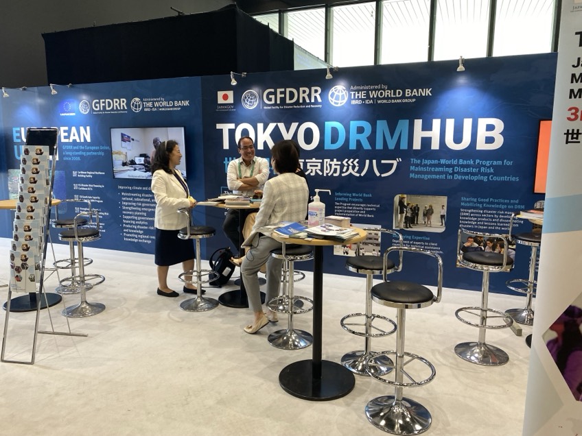The booths area continued to be filled with lively discussions and networking. People learned about each other's work, shared their own activities, and got to know one another. Here is the booth of the World Bank Tokyo DRM Hub. #UR24