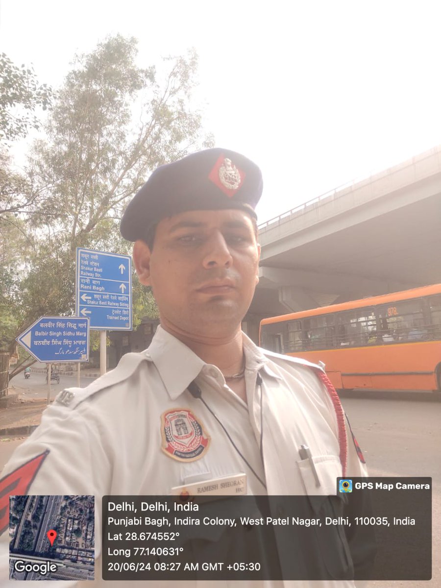 Traffic regulation by staff of Western Range in morning