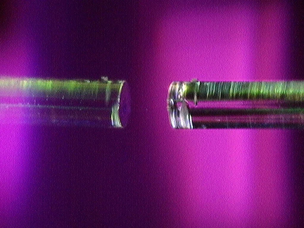 A small concave depression in the surface of an optical fiber with a mirror in it. A similar setup was used in the experiment.