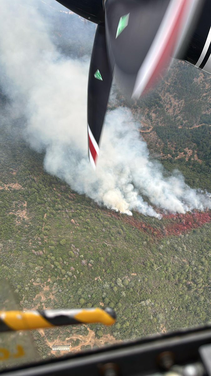 CALFIRENEU's tweet photo. CAL FIRE/Placer County firefighters making access in difficult terrain to the Double Fire off Double Eagle Way near Brownsville in Yuba County. Air resources are over the fire making retardant drops. The fire is approximately 7 acres with spotting a half mile ahead of the fire. https://t.co/u435ZOy8UK