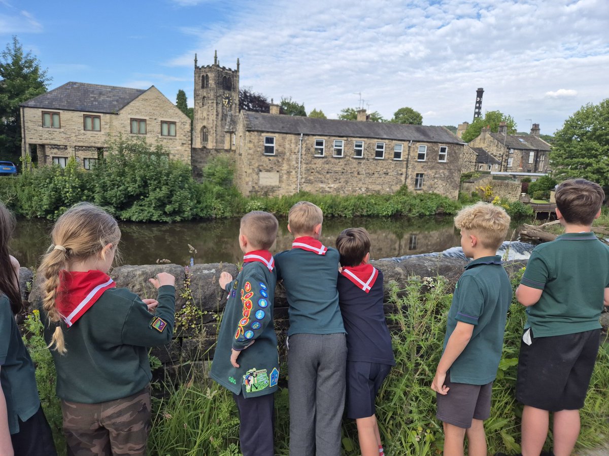 Lovely summer solstice walk on the river tonight.  Here we're all looking out over at the scout hut and learning that there used to be a mill just after the weir back in the day!