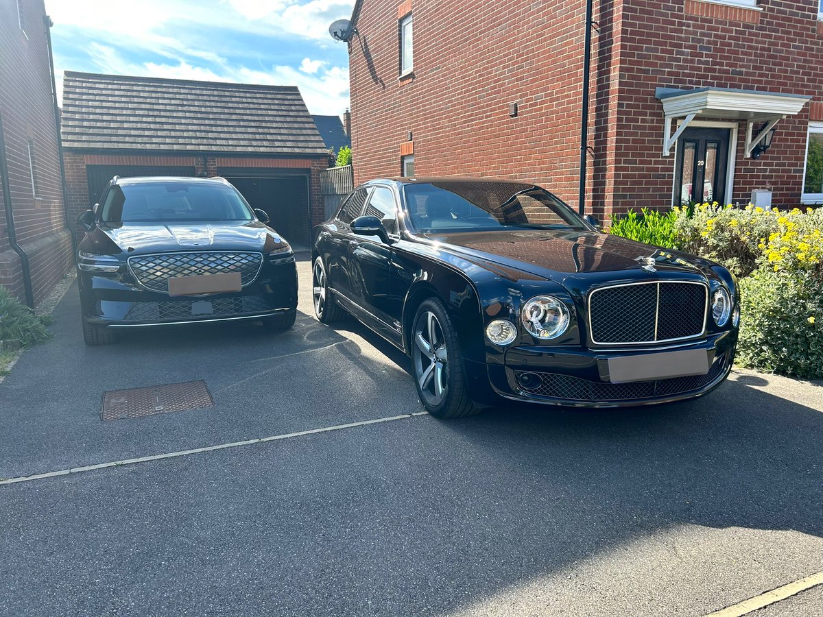 The new two car garage.. 

( and yes before I get any comments they do both fit in the garage )