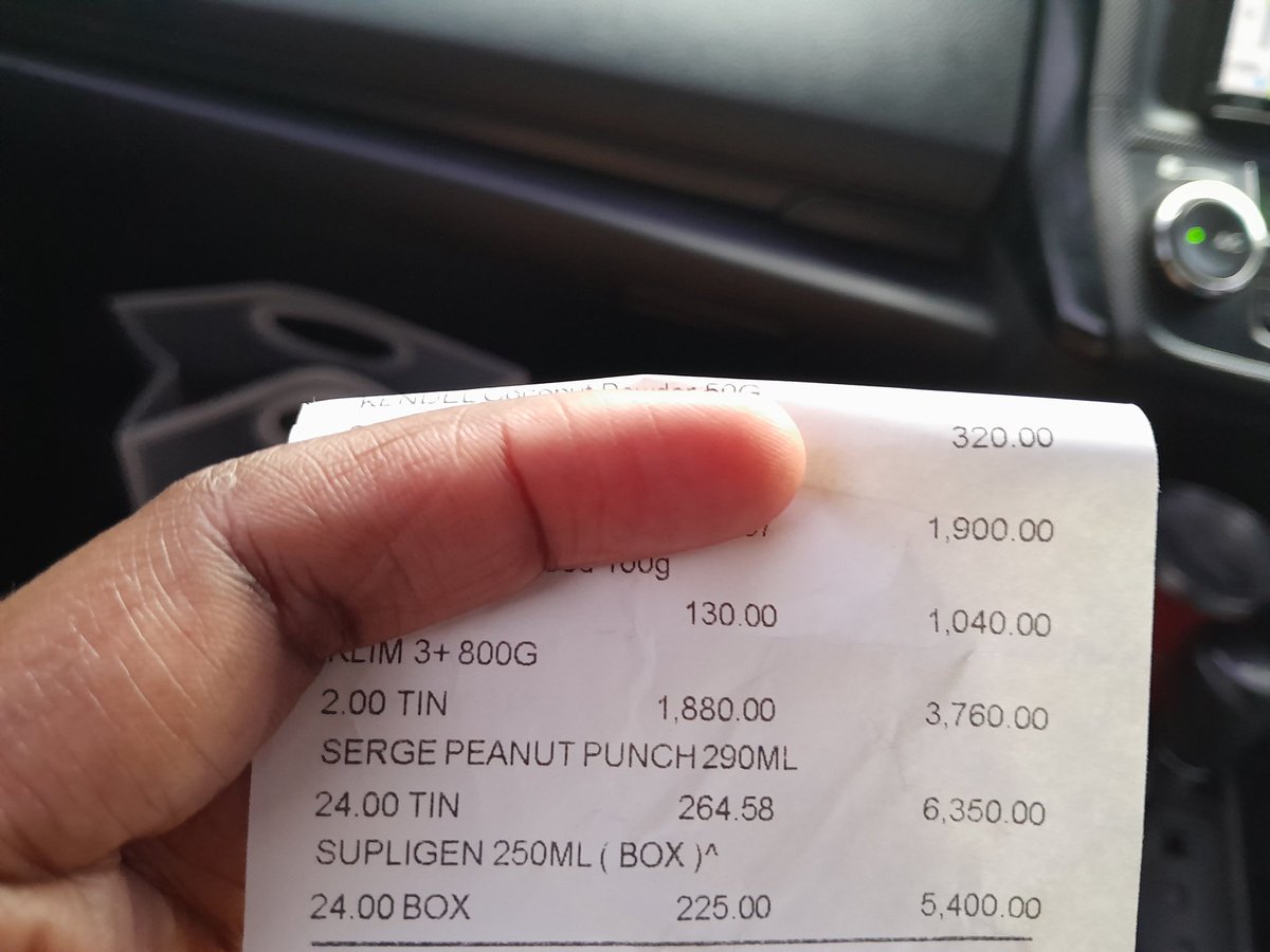 TsahaiMorgan's tweet photo. Always check your receipts. Got cashed for a case of tin peanut punch but bought the box ones. Price difference was over JM$3000. Had to go back for my money. 😱 https://t.co/O42JtiqBIg