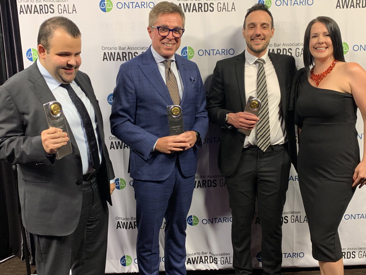 Mohammed Elshafie, Thomas G. Conway and Abdalla Barqawi accept the President’s Award from Kelly McDermott for their efforts in setting the bar for accommodation and creating a space where all lawyers can thrive. #OBAawards