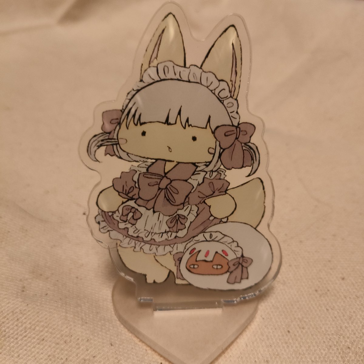 ナナチ(メイドインアビス) 「【ゆかいなお知らせ】かわいいアクスタBOOTHに追加しました!よろしくお願いしま」|けだまのイラスト