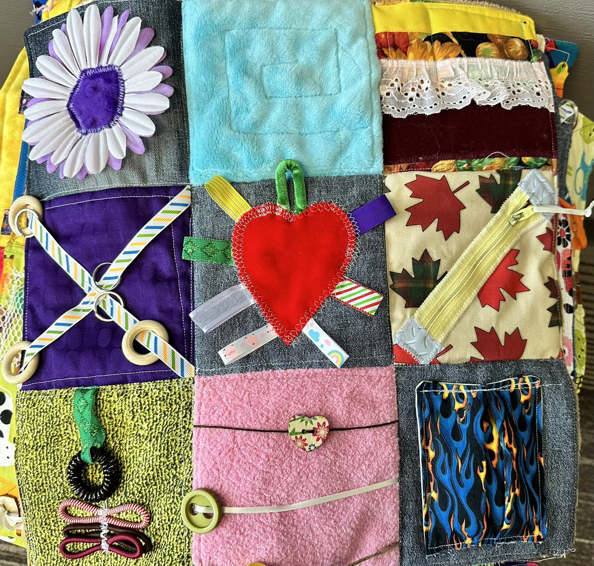cynthia_shelley's tweet photo. Thank you to Annette and Marie for  their donation @FMPSD on behalf of the Northern Lights Quilters guild ❤️ This is a sampling of the fidget/sensory lap quilts that will help to support our students who have tactile &amp; sensory needs.  We are so very appreciative.  #CommunityLove https://t.co/aE5gdBJ9RF