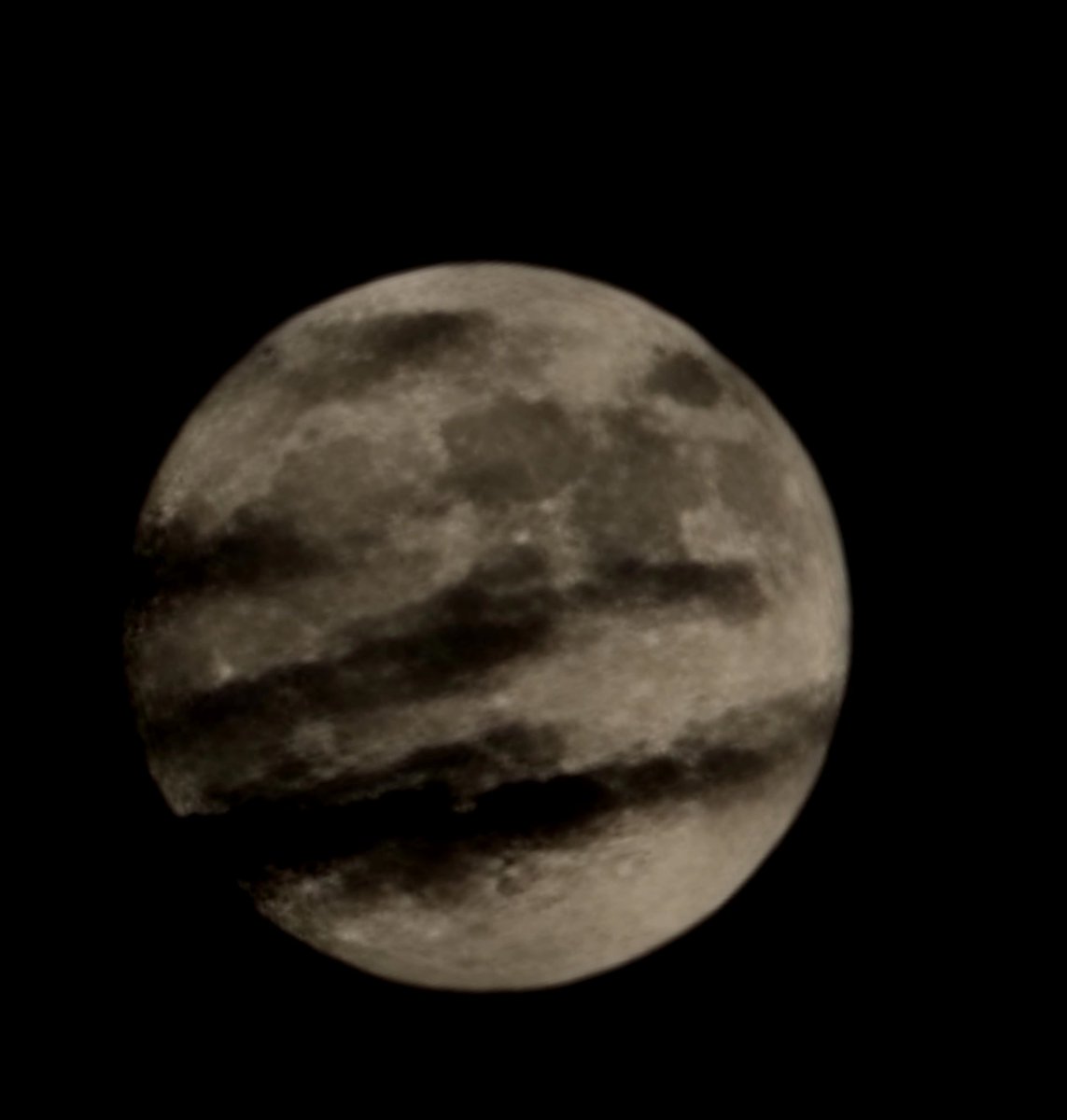 Got this cool photo of the moon that looks like the <a href="/Raptors/">Toronto Raptors</a>  logo