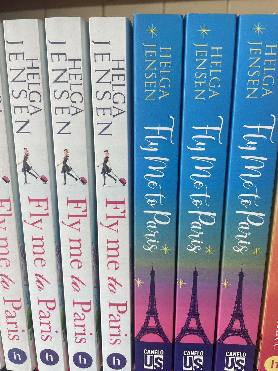 HelgaJensenF's tweet photo. Looking at my spines today 🥰 🤣 I have managed to get my hands on a few copies of the US version of Fly me to Paris. Aren't both spines just gorgeous together?! #USrelease #books #CaneloUS #herabooks #Canelo #authors #newbooks #writingcommunity https://t.co/mVCaeOQnRH