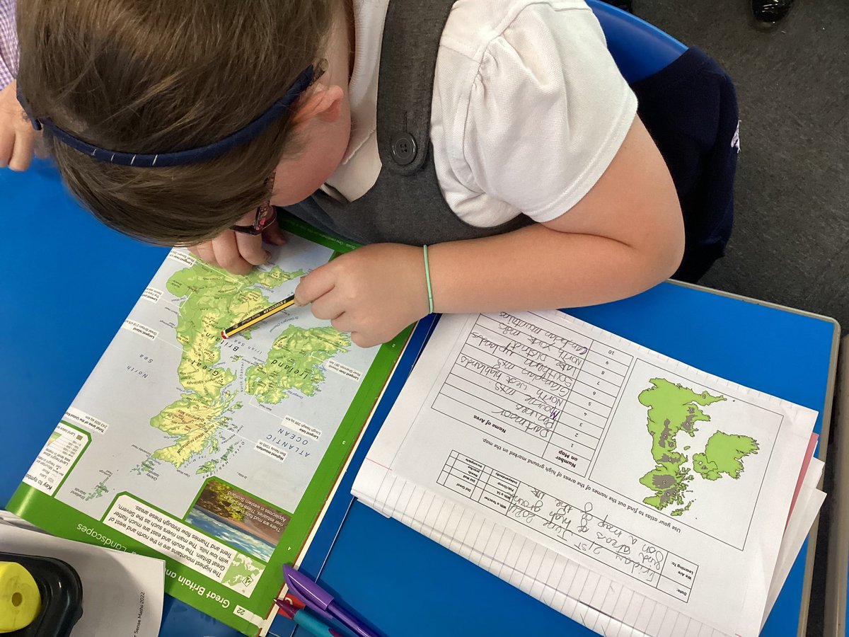 In Geography, we have been using an atlas to find higher, mountainous areas in the UK. #owpsgeography
