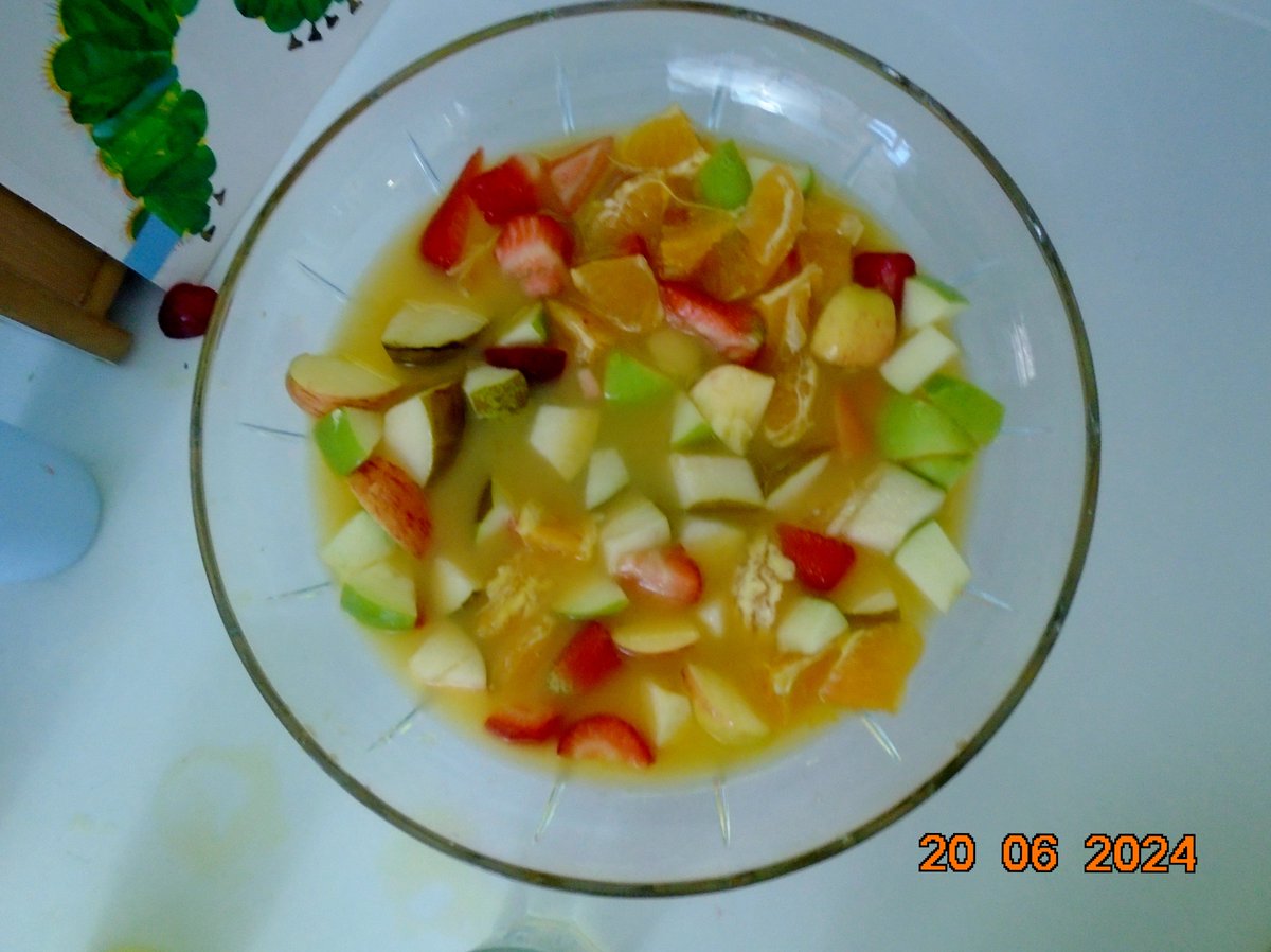 Children helped make a delicious 'Very hungry Caterpillar' fruit punch. They helped count out and cut fruit before sitting together at Group Time to enjoy it.
"Cut it in half!"
"It taste like sweet, it my favourite."
" 3 plums."
"We got fruits."
"Like juice!"