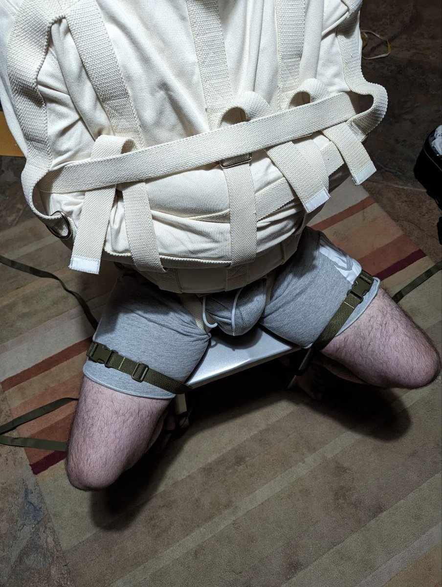 ThatBondageguy's tweet photo. After I had my fun with @ColoradoBondage, he was nice enough to return the favor. Here I am in his canvas straight jacket, his sock stuffed in my mouth, vetwrap to hold that in, and blindfolded. He then proceeded to tickle my vulnerable feet.

Fun with the bulge came later 😏🥵 https://t.co/3P44nY8WYT