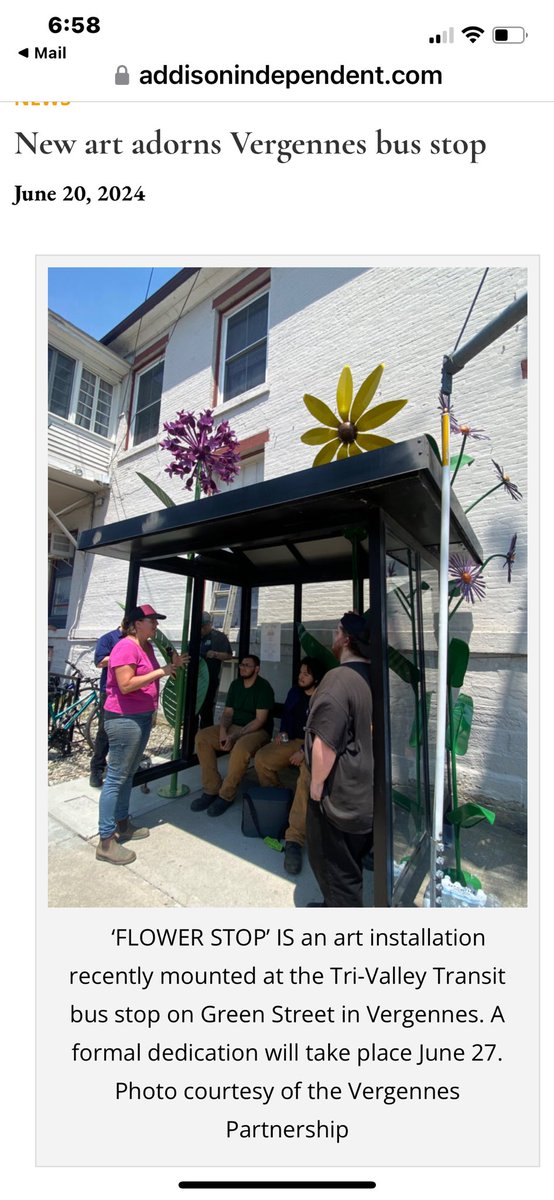 Thanks to ⁦⁦<a href="/addyindy/">Addison Independent</a>⁩ . These flowers didn’t lose their petals in the downpour. Best looking bus shelter around downtown #Vergennes