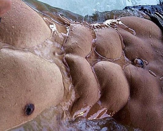 [Exhausted from a long day at sea, he drew himself a warm bath at home and sank into the water with a sigh.]