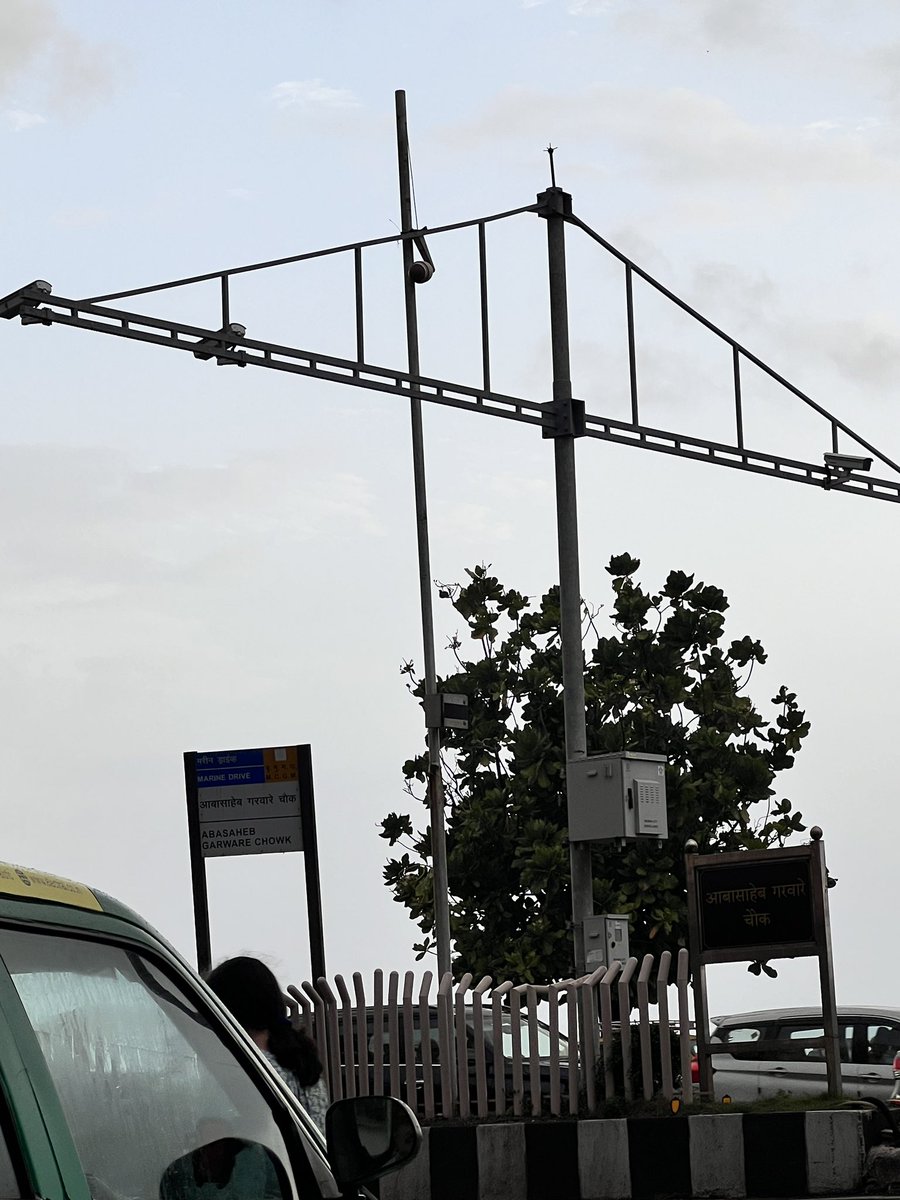 NPCCA's tweet image. This camera is dangling loose at A Garware junction, #MarineDrive ready to fall any moment. @mybmcWardA @MumbaiPolice pls fix before someone gets hurt