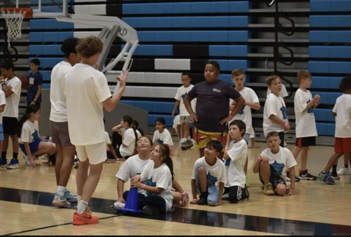 It’s an awesome feeling seeing your kid being the kid he looked up to just a few years ago! “Everybody’s happy to be here, everybody's having fun, and that’s all you can wish for,” senior point guard Titus Sutton said. “It's great being able to have a positive influence”