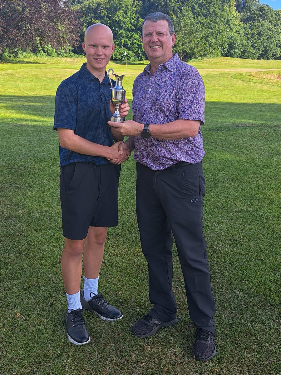 Congratulations to our Junior Captain, Harry Hall, who today became a three time Junior Club Champion following previous successes in 2021 and 2023, retaining the trophy with a gross 77 and seen here with our Junior Organiser, James Crawford.  
#juniorgolf #juniorclubchampion