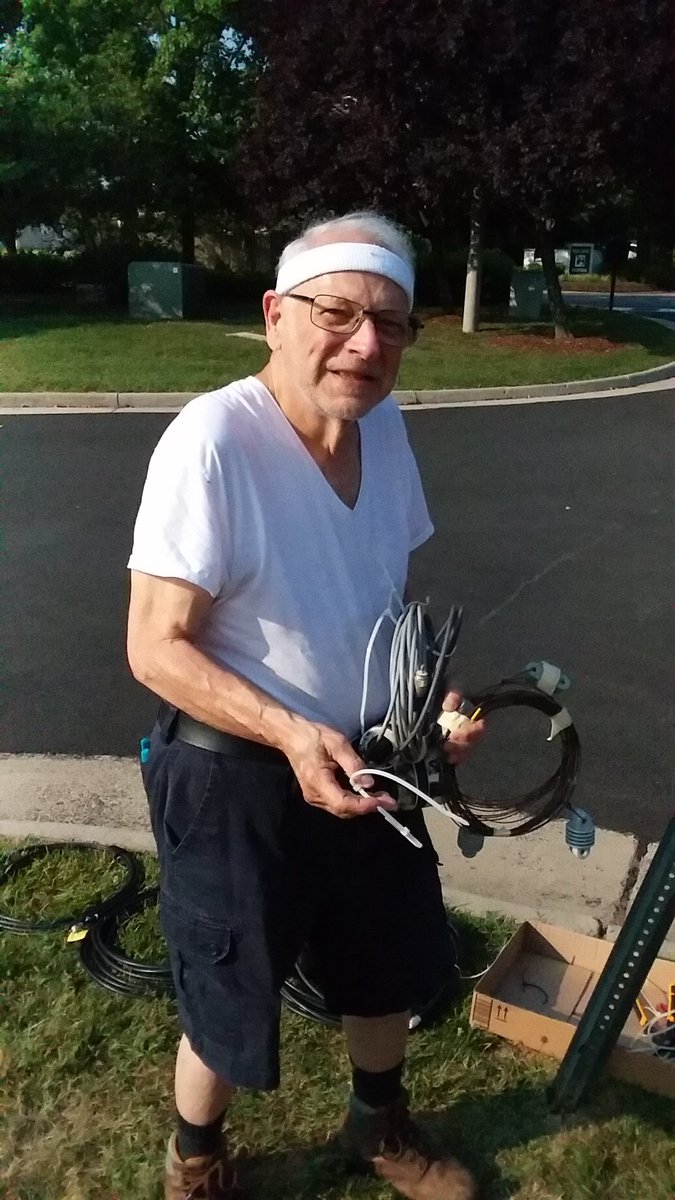 Yea, it's hot, but the antenna is going up! Bud, W4KSN, prepares a windom for Sterling Park ARC at the Eastern Loudoun Sheriff's Station.  #ARRLFD #amateurradio #hamradio