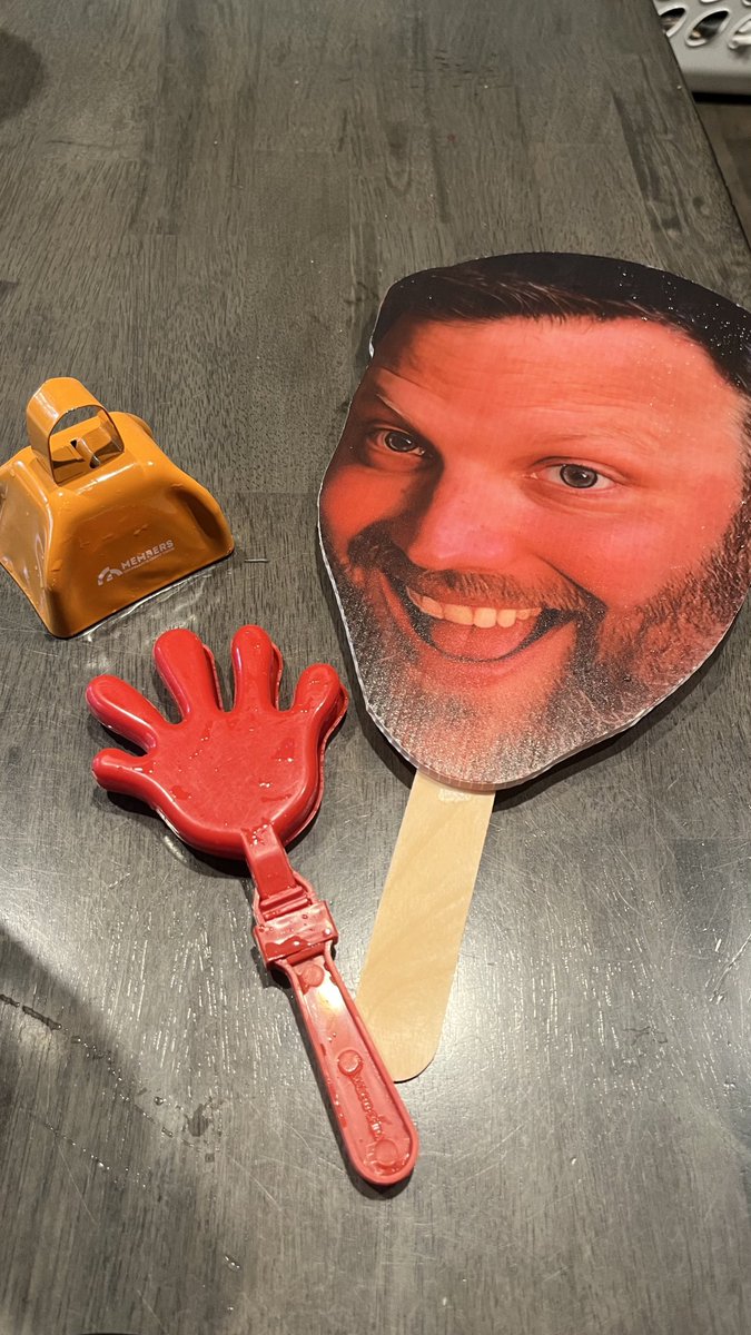 My tools of the trade for spectating today. That’s my friend’s husband. 🤣
