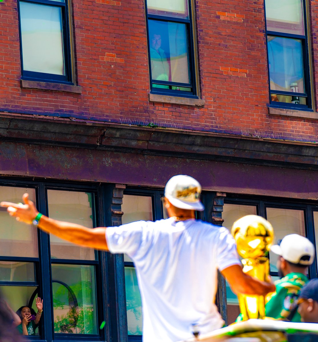 TirrinWoW's tweet photo. Took a break from WoW to watch the Celtics win the NBA championship. Got these shots downtown Boston during the parade.