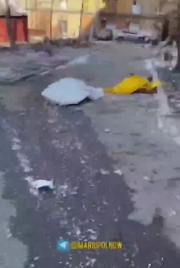 I am Ukrainian, I hate Russians.  The photo shows peaceful residents of Mariupol, killed by the Russian army. My mother is under a white blanket. I hope I am doing enough to take revenge.