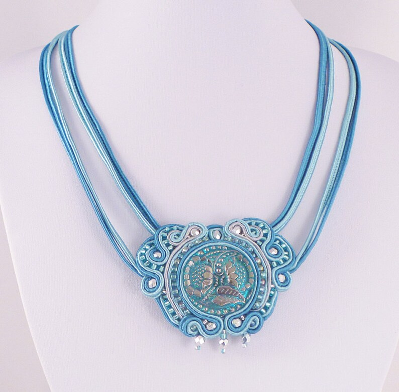 Iced Blue

Beautiful soutache and beaded necklace in icy blue and silver, perfect for sunny days and hot summer nights 

etsy.com/uk/listing/650…
#ukgifthour #etsy #mhhsbd #CraftBizParty