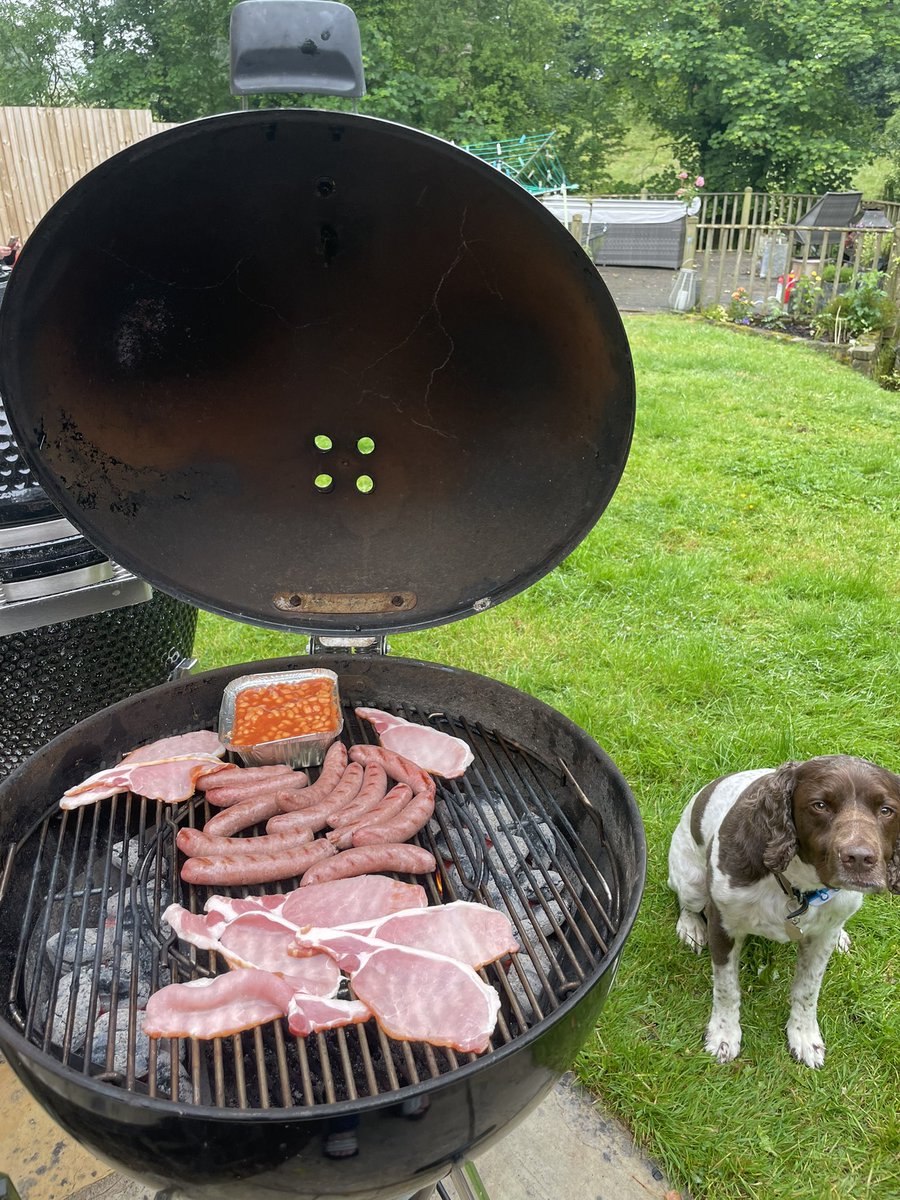 _stevenstewart's tweet image. Barbecuing breakfast in a mild drizzle – nothing says British summer quite like it! #BritishSummer