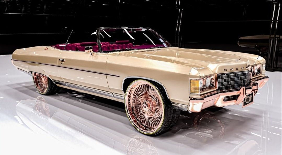 WorldWideCarsTM's tweet photo. '71 Impala on Big Hub Rose Gold Daytons with the Barney interior https://t.co/mOOEvHCAyQ