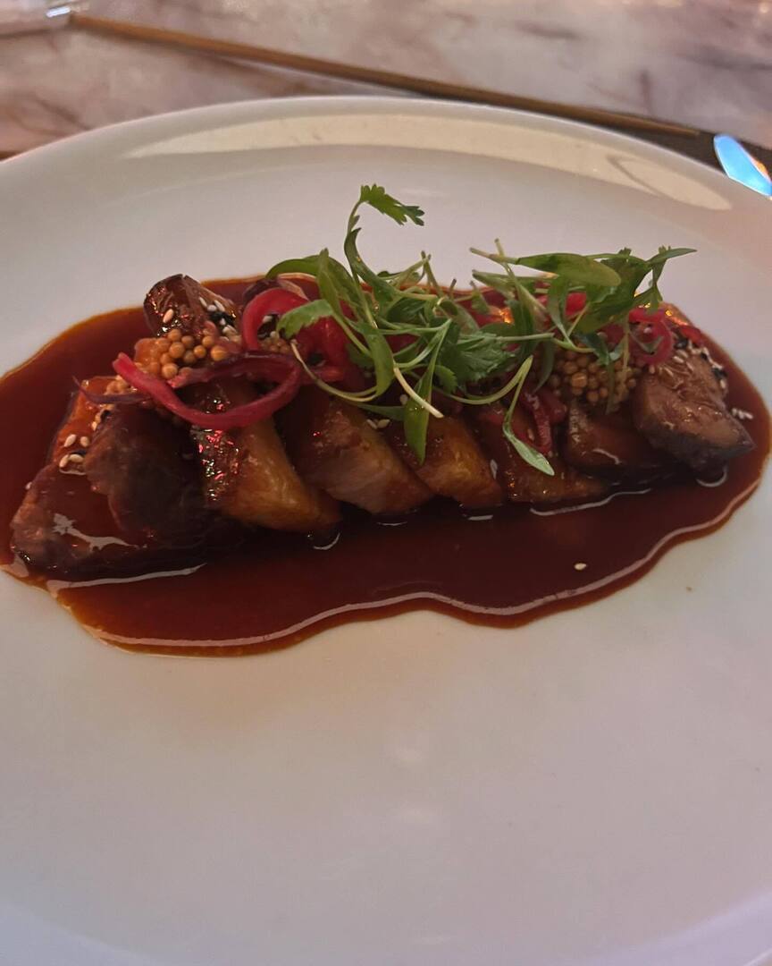 korean glazed pork belly <a href="/carversteak/">Carversteak</a> w/ pickled mustard seed, scallion. carversteak, resorts world las vegas. instagr.am/p/C8lZDdSx4O8/