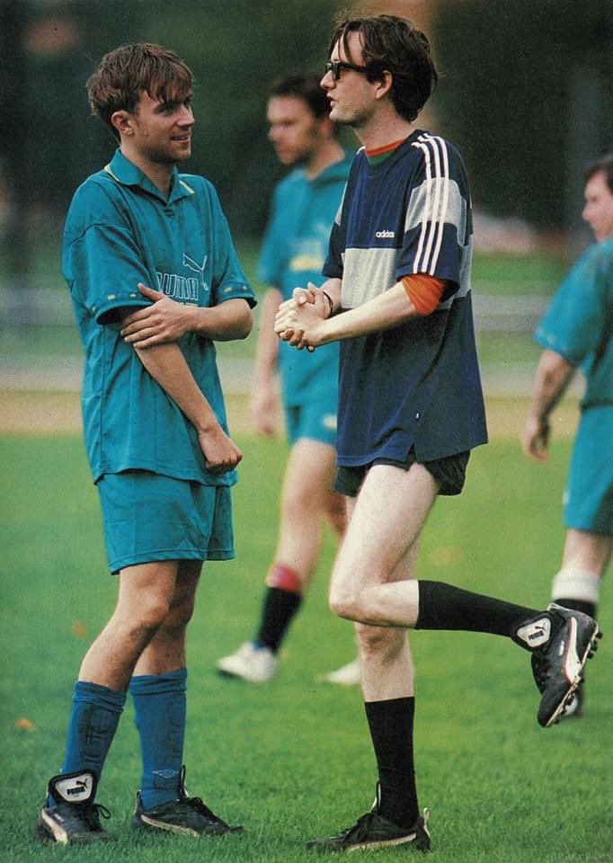 Just a couple of common people enjoying a kickabout before heading to the clubhouse for some post-match coffee and TV.