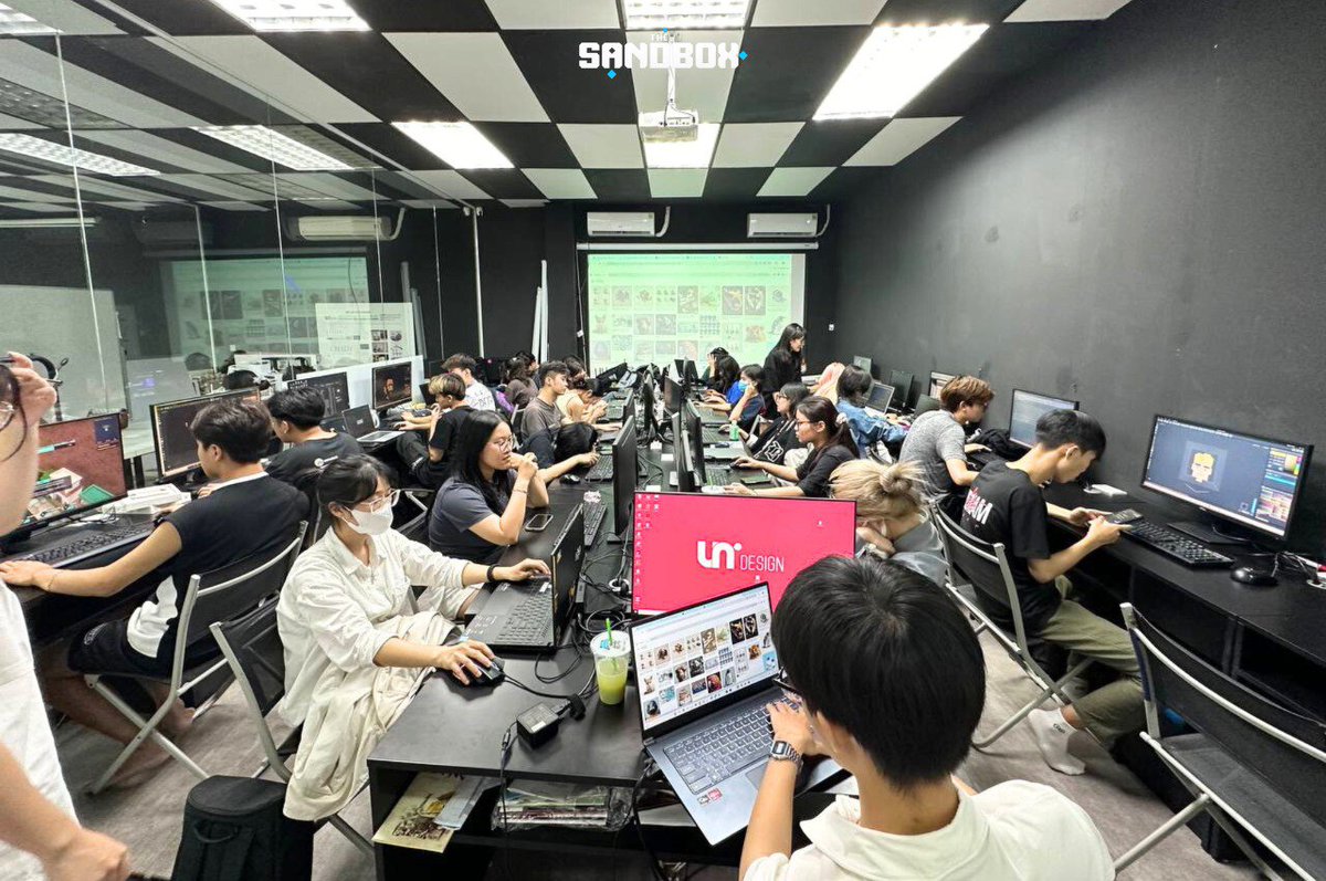 SandboxVietnam's tweet photo. [ 📸RECAP ||  TRAINING PROGRAM “CRACK THE METAVERSE” TẠI UNIDESIGN 📸]

🎬Ngày 04.07 vừa qua, The Sandbox Vietnam phối hợp cùng @Stronghandcat tổ chức thành công buổi training "Crack the Metaverse" dành cho các bạn học viên tài năng của Viện Đào tạo Quốc tế UniDesign. Buổi training thu hút sự tham gia của hơn 30 các bạn học viên, các bạn đều rất hào hứng và thích thú khi được trải nghiệm một lĩnh vực vô cùng mới mẻ - Metaverse.

📌Các bạn học viên đã có cơ hội được gặp gỡ và trò chuyện cùng đại diện của The Sandbox tại Việt Nam - Anh Cris D. Trần về Metaverse và The Sandbox. Bên cạnh đó, với sự đồng hành của đội ngũ đào tạo đến từ The Sandbox Vietnam, các bạn tham gia đã học được cách tạo Asset/Experience trên The Sandbox. Cuối buổi training, ban tổ chức đã tạo những phút giây thoải mái để các bạn cùng giao lưu ăn uống, nhận Certificate và các phần quà “xịn xò” như: bình nước, lanyard, khẩu trang,...

📷Hãy cùng nhìn lại những khoảnh khắc đáng nhớ tại buổi training vừa qua và cùng chờ đón những hoạt động tiếp theo đến từ The Sandbox Vietnam trong tương lai nhé!

English Caption below 👇

🎬On July 4th, The Sandbox Vietnam collaborated with @Stronghandcat to successfully host the "Crack the Metaverse" training session for talented students of UniDesign International Training Institute. The training attracted over 30 students, all of whom were excited and enthusiastic to experience the exciting new field of Metaverse.

📌The students had the opportunity to meet and talk to The Sandbox Vietnam's representative - Mr. Cris D. Tran about Metaverse and The Sandbox. In addition, with the support of the training team from The Sandbox Vietnam, participants learned how to create Assets/Experiences on The Sandbox. At the end of the training session, the organizers created a relaxed atmosphere for the students to socialize, eat, receive Certificates and cool gifts such as water bottles, lanyards, masks, etc.

📷Let's take a look back at the memorable moments of the training session and look forward to the next activities from The Sandbox Vietnam in the future!
______________________________
𝗧𝗵𝗲 𝗦𝗮𝗻𝗱𝗯𝗼𝘅 - 𝗮 𝗱𝗲𝗰𝗲𝗻𝘁𝗿𝗮𝗹𝗶𝘇𝗲𝗱, 𝗰𝗼𝗺𝗺𝘂𝗻𝗶𝘁𝘆 𝗱𝗿𝗶𝘃𝗲𝗻 𝗽𝗹𝗮𝘁𝗳𝗼𝗿𝗺, 𝘄𝗵𝗲𝗿𝗲 𝗰𝗿𝗲𝗮𝘁𝗼𝗿𝘀 𝗰𝗮𝗻 𝗺𝗮𝗸𝗲 𝘃𝗼𝘅𝗲𝗹 𝗮𝘀𝘀𝗲𝘁𝘀 𝗮𝗻𝗱 𝗴𝗮𝗺𝗶𝗻𝗴 𝗲𝘅𝗽𝗲𝗿𝗶𝗲𝗻𝗰𝗲𝘀 𝗮𝗻𝗱 𝗺𝗼𝗻𝗲𝘁𝗶𝘇𝗲 𝘁𝗵𝗲𝗺 𝗼𝗻 𝘁𝗵𝗲 𝗯𝗹𝗼𝗰𝗸𝗰𝗵𝗮𝗶𝗻.
🌎 Facebook: https://t.co/6PGzwYBBtS
📩 Email: vietnam.media@sandbox.game
🔔 Telegram: https://t.co/5O1nSj7ytL
📍 Twitter: https://t.co/5PaEQpTa34
#TheSandbox #sandfamvietnam #Metaverse #CrackTheMetaverse #UniDesign #Training