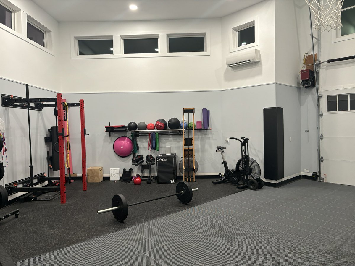 douglakemd's tweet photo. @northwoods1980 Here’s my set up:

3/8 in rubber flooring for 1/2, sport court flooring other 1/2
BB hoop
Folding Rogue rack
Used treadmill 
Adjustable DBs
Adjustable KB
Fringe Sport AirBike
Fringe plates
Rogue folding bench

2 mini splits are perfect HVAC

Equipment total around $5k. https://t.co/NXjSydTXFr