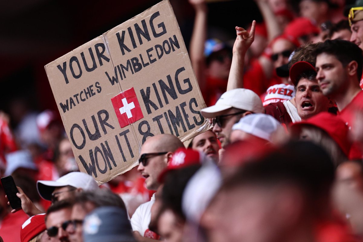 Quality sign from the Swiss fans at the Switzerland-England Euro game:

'Your king watches Wimbledon, our king [Roger Federer] won it 8 times'