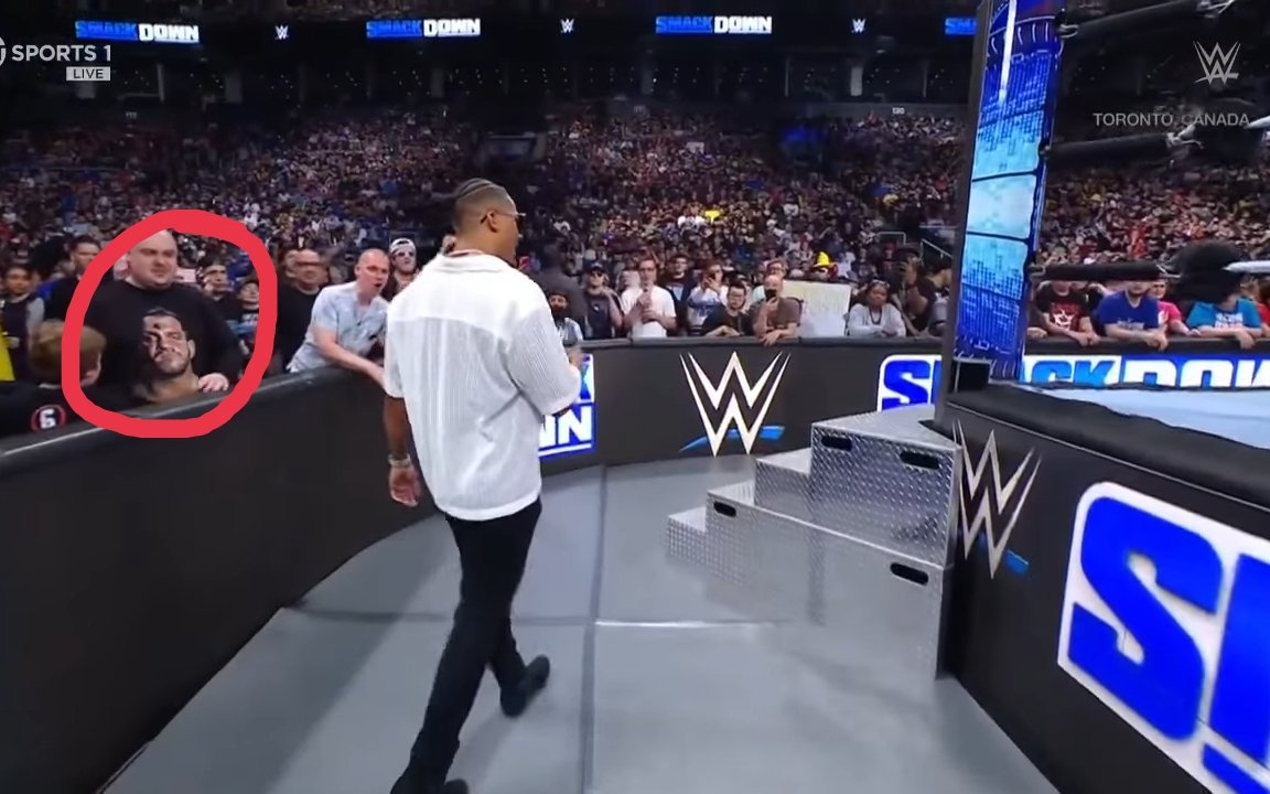CarlDHicks's tweet photo. Is this guy wearing a Chris Benoit Shirt? #Smackdown #MITB https://t.co/71ShtDs38S