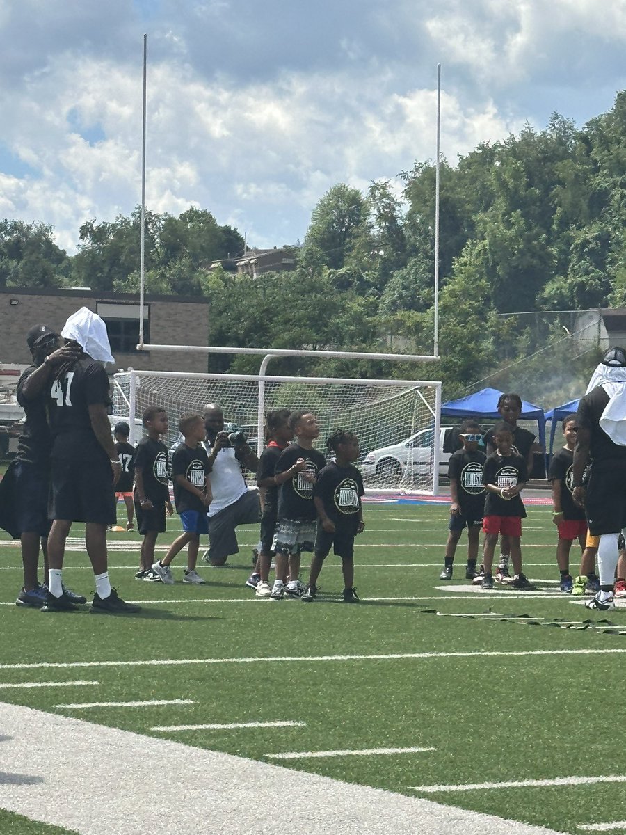 WanzoDr's tweet photo. MASD alumni and New Orleans Saints player, Khaleke Hudson, held his annual camp today.  It was a phenomenal event. After the camp, the campers were treated to a pool party. #MASD #Football #Togetherwecan https://t.co/17RXS38D2x