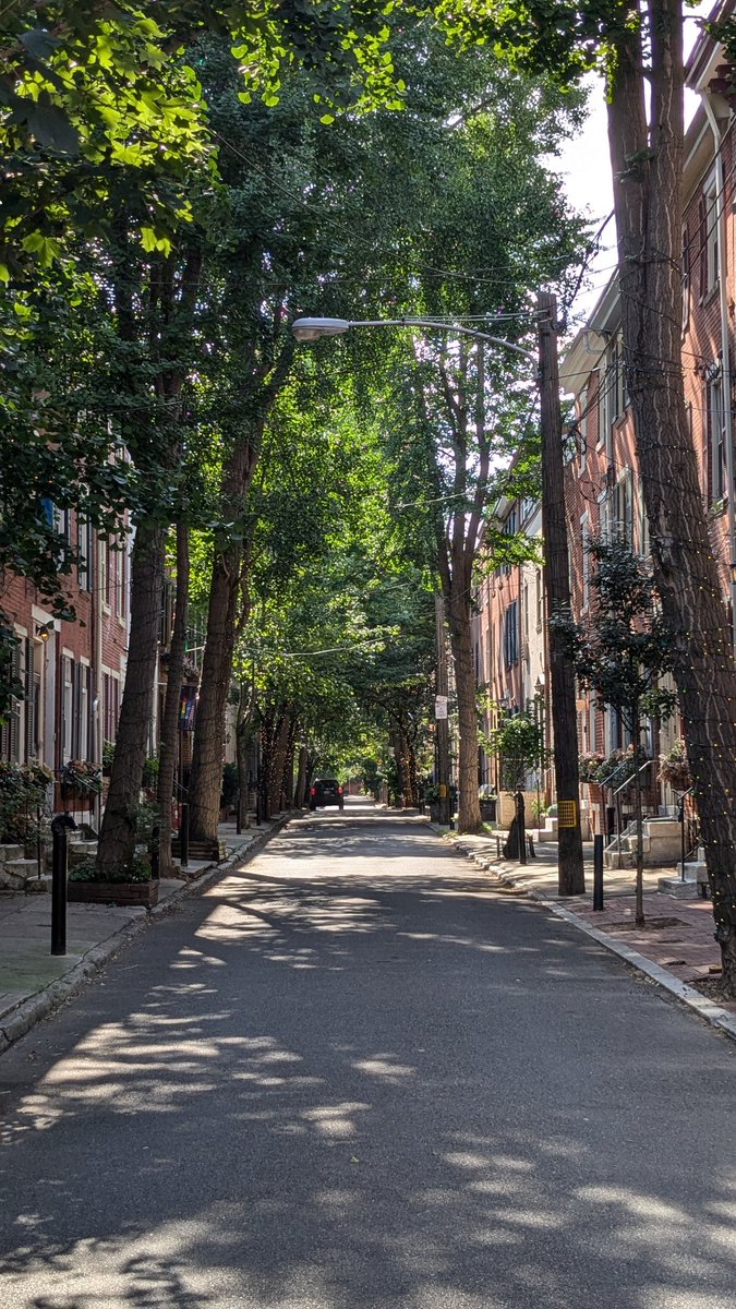 Philadelphia demonstrates that nothing cities do to make streets look charming (e.g. design guidelines, zoning mandates, discretionary approval by review boards) will ever be as effective as simply prohibiting on-street parking.