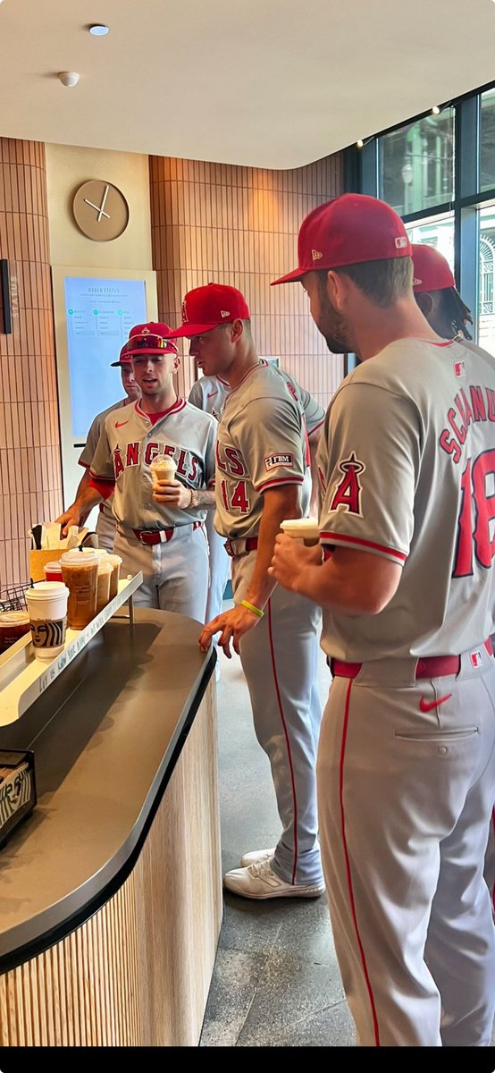 Spulmonarx's tweet image. Body  language of O’Hoppe is all business- one hand tapping counter, other on his hip. Even when picking up donuts and coffee. You know he checked the order several times to make sure it was right. #FutureCaptain