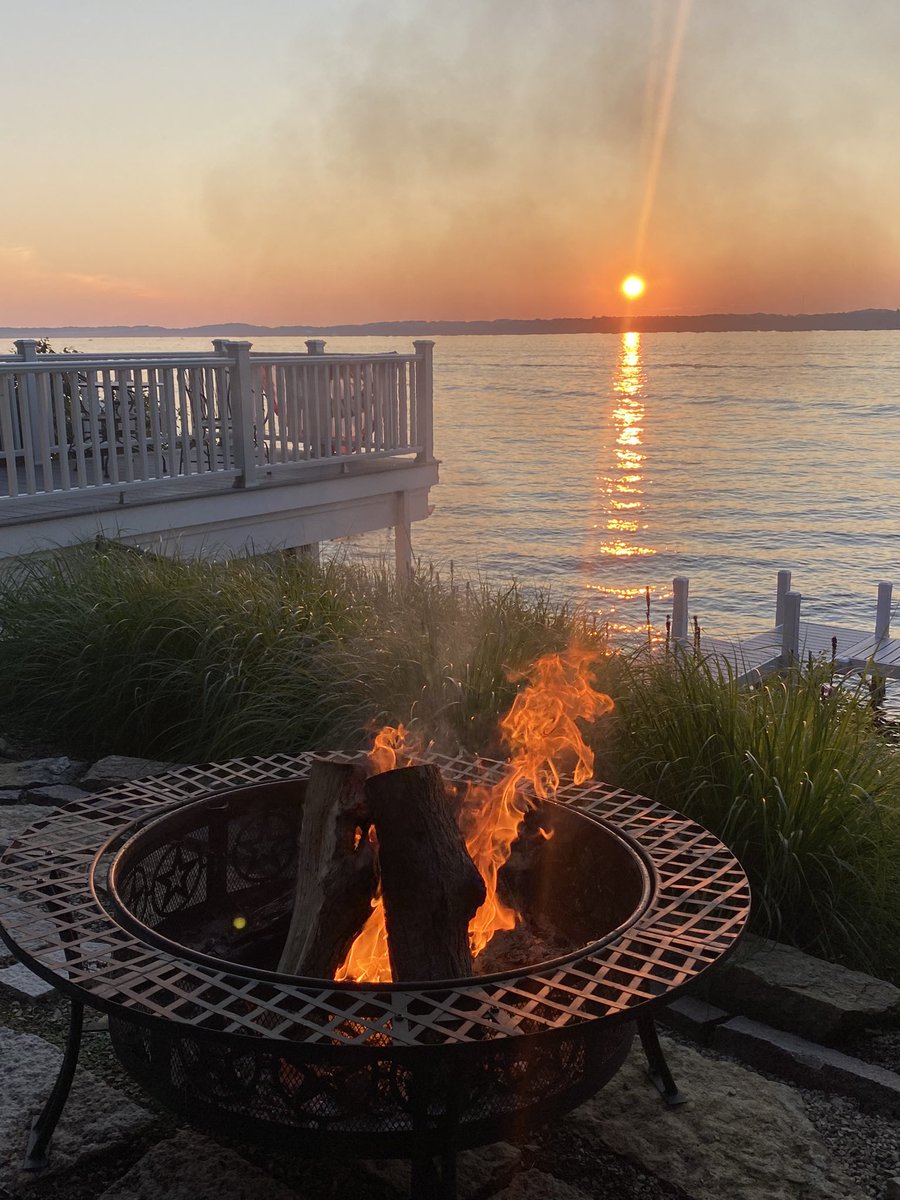 MRHogan13's tweet photo. Nothing better than a fire at sunset on #GreenLake #InWisconsin https://t.co/iVjlpAJC48