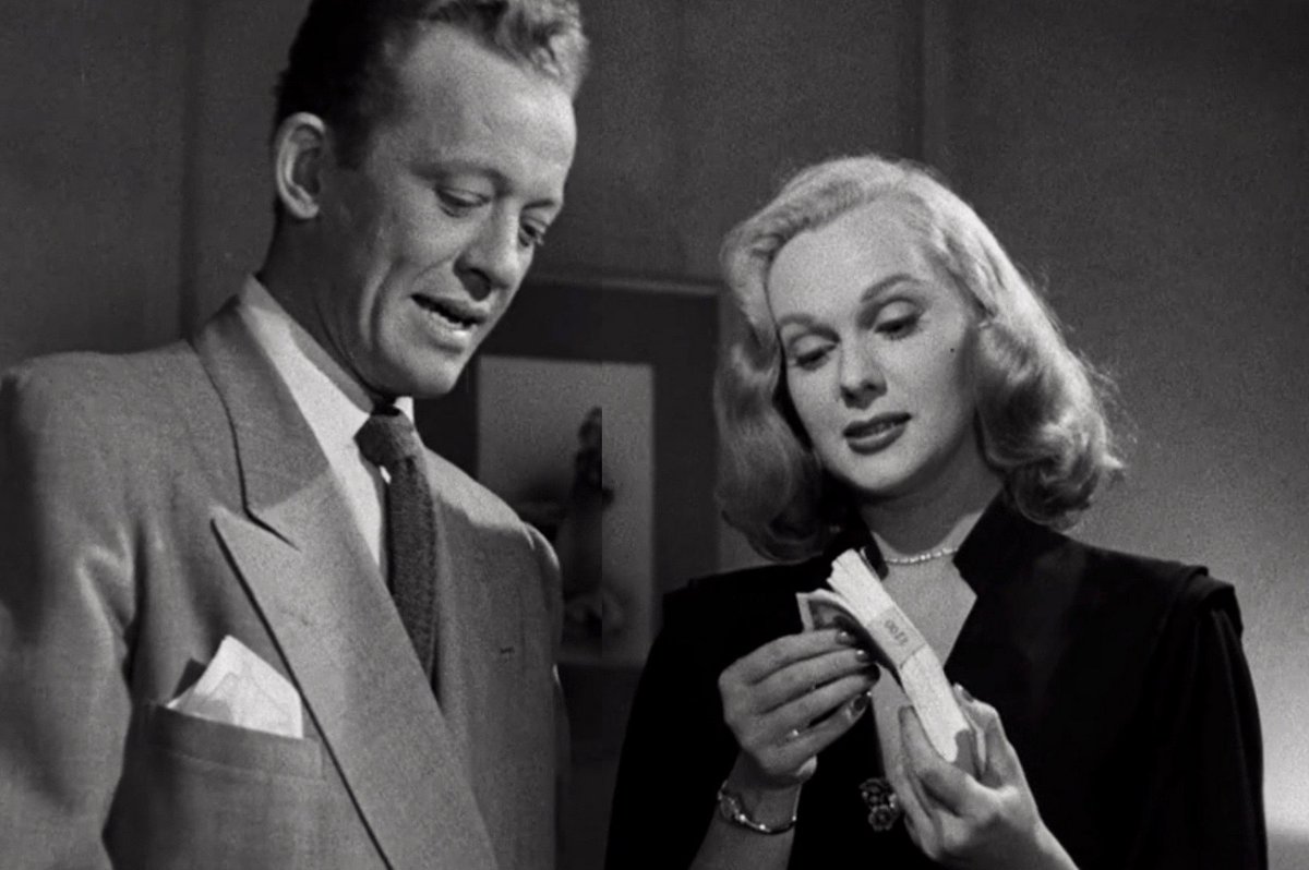 KeysSteven's tweet photo. @NoirAlley Bill and Adele, aka, "Boots"

What i don't get is, why would a guy whose gun moll has "Million Dollar Legs" wanna rob an armored car worth half as much? Oh .. right, forget it.

#armoredcarrobbery 50 #ilovetrouble 48
#noiralley #filmnoir #noir #tcmparty https://t.co/vb3RQQxmRW