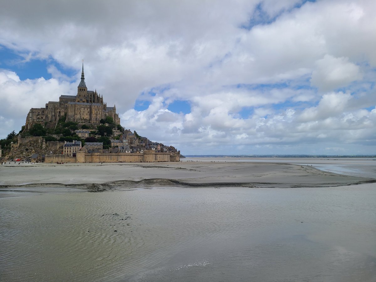 StBridgit's tweet image. Mont St. Michel - well worth the trek out to visit. The tide was out while we were there, but it's not unheard of for tourists to drown bc they went out on the salt flats and got trapped by the rising tide, which comes in quickly. 😬 My advice is to stick to the bridge 👍
