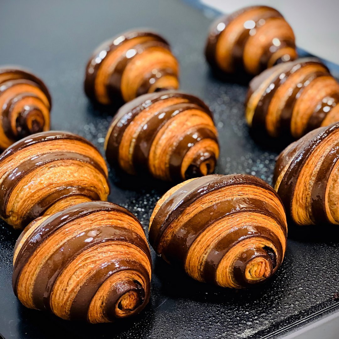 We believe every day is made sweeter with a little chocolate, wouldn't you agree? 😋 

As today is #WorldChocolateDay, why not stop by and enjoy a cup of our freshly brewed coffee paired with one of our delicious pain au chocolats? 🌍🍫

#HarryGowBakery #HarryGow #Sustainable