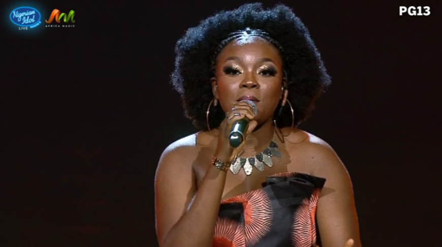 Nigerianidol's tweet photo. Chioma delivered an energetic rendition of Jodie's ‘Kuchi Kuchi’ from her 2010 album 'African Woman'. She’s given falsettos, low registers and big vocals 🌟👏🏾. 

Come along her #NigerianIdol journey https://t.co/stKOIvVulx. https://t.co/sC0lDfM68V