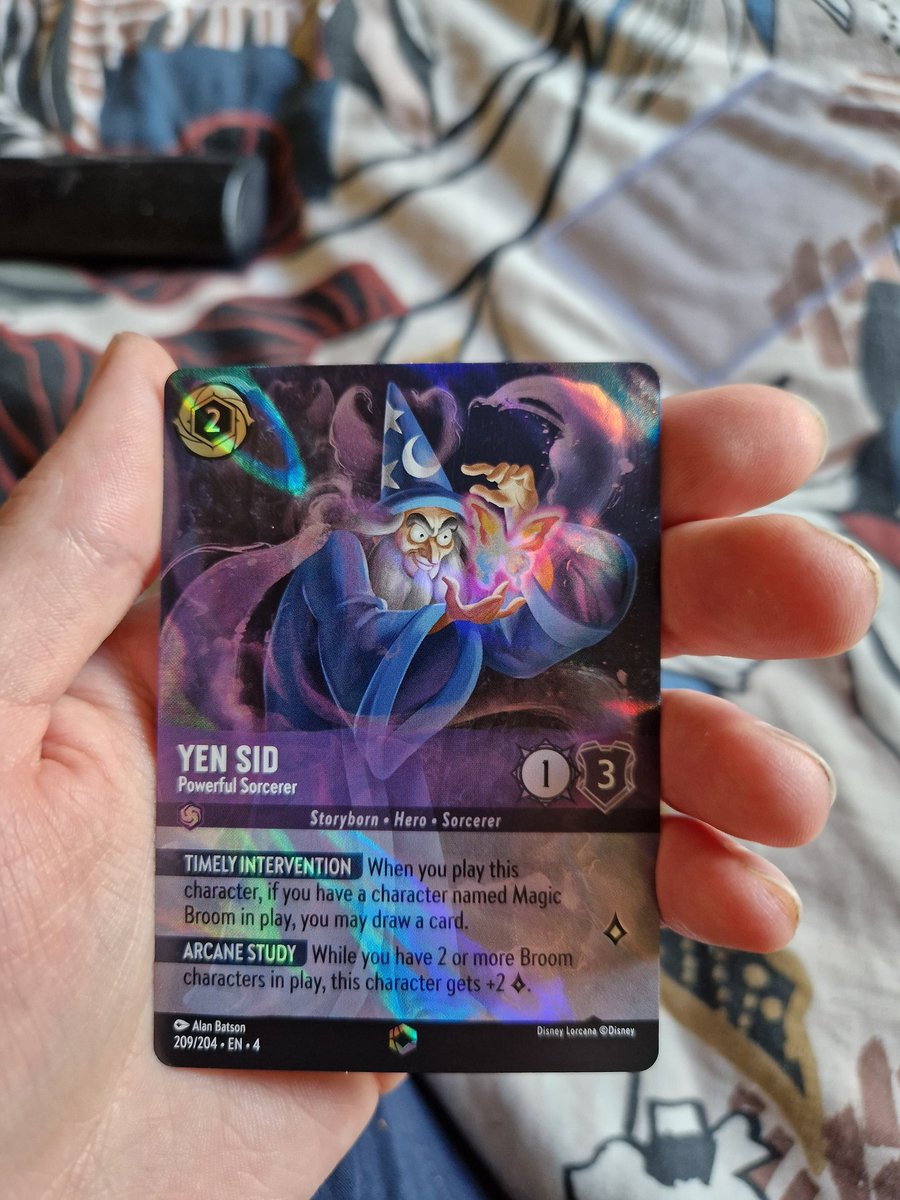 HeathenMyself's tweet photo. Managed to pull my first enchanted card! Not Alice but hell yeah I'll take it! 

#lorcana https://t.co/iIZhN6UbTo