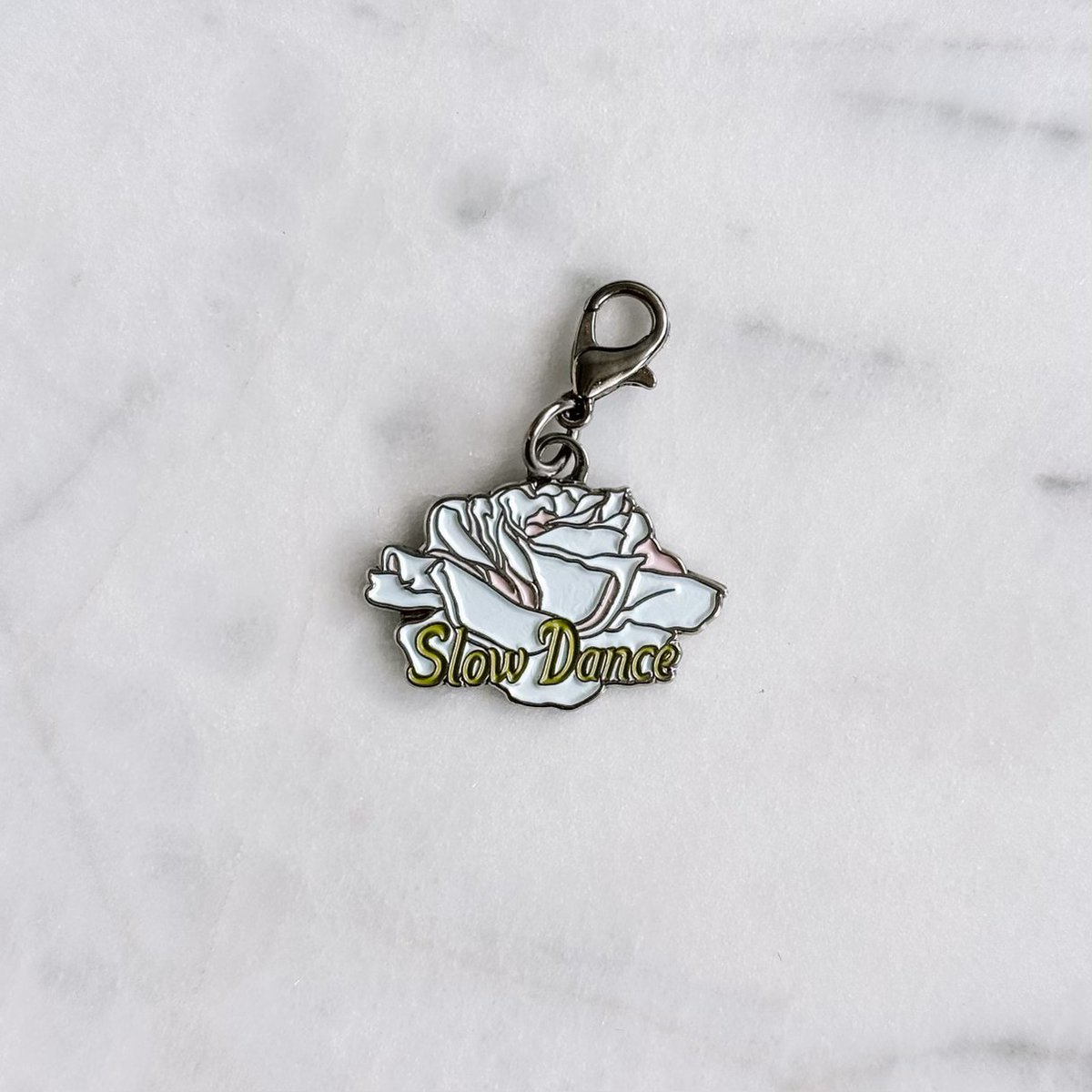 CALLING ALL RAINBOW ROWELL FANS! Get an exclusive Slow Dance charm when you pre-order her new book in any format from any retailer! Learn more: bit.ly/4cP1mGv