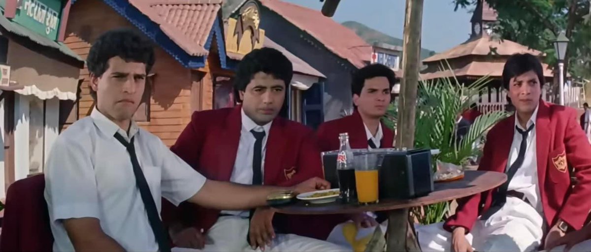 Jo Jeeta Wohi Sikandar is a treasure trove of Easter Eggs. Everytime you feel, you know everything that is to be known about the movie, another fun trivia pops out. 
Presenting the composers Jatin-Lalit as St. Xavier’s School Student.